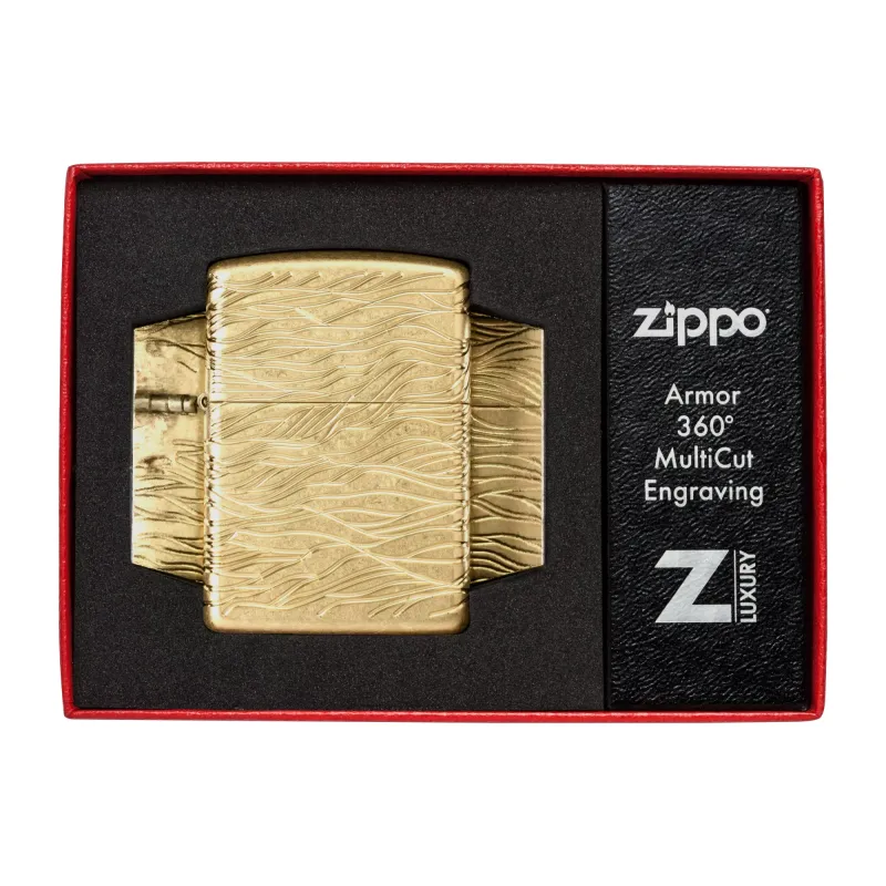 Зажигалка армированная бензиновая ZIPPO Armor® 360° MultiCut Tumbled Brass Luxury Waves, золотистая (46273)