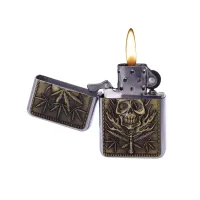 Запальничка бензинова CHAMP Leaves череп, канабис, хром, золотистий (40400230) Запальничка бензинова CHAMP Leaves череп, канабис, хром, золотистий (40400230)