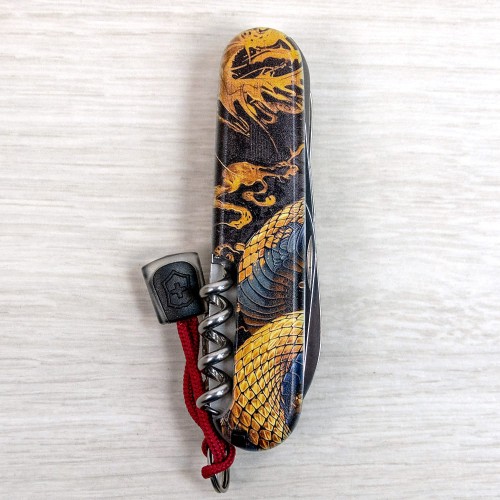 Складаний ніж Victorinox HUNTSMAN ZODIAC Дерев'яна змія 1.3713.3.Z4280pk