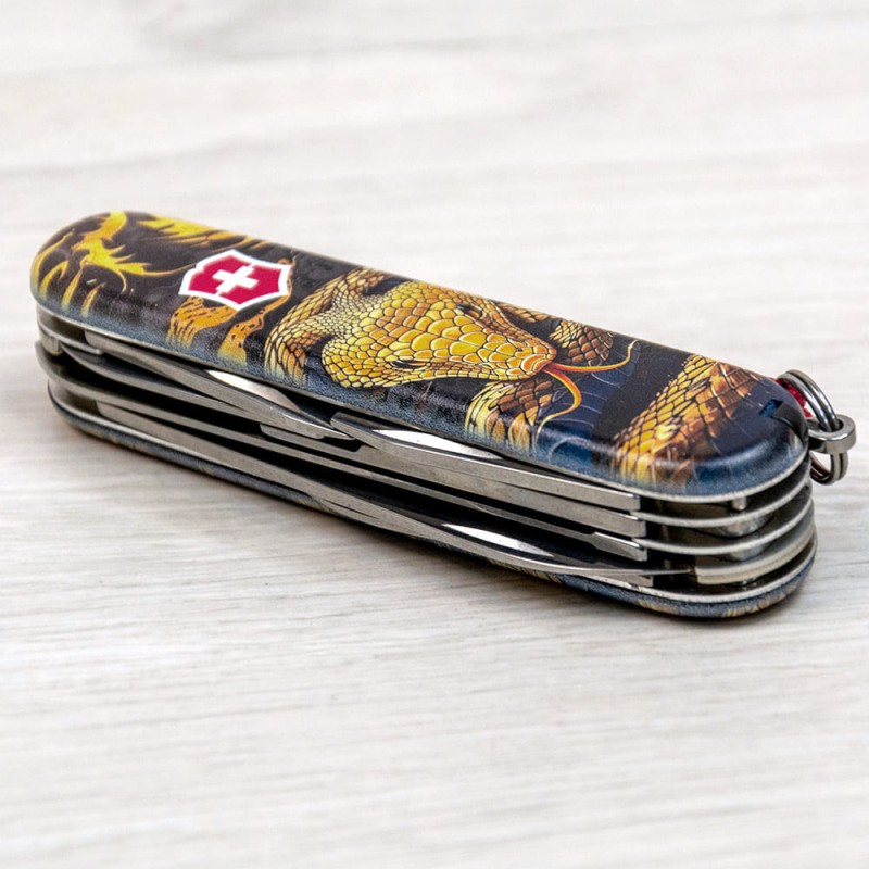 Складаний ніж Victorinox HUNTSMAN ZODIAC Дерев'яна змія 1.3713.3.Z4280pk